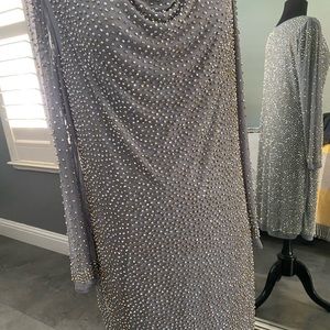 Beaded silver long sleeved Cocktail dress.